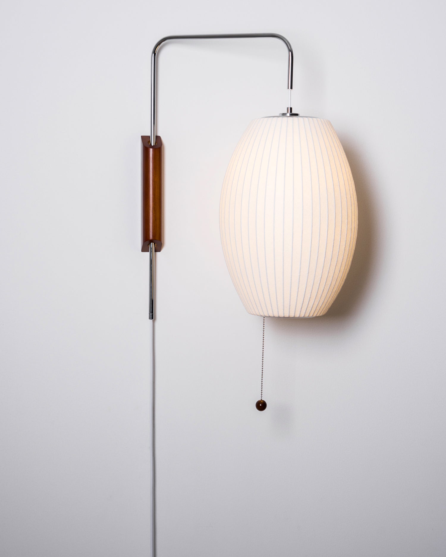 Orbit Plug-In Swing Sconce