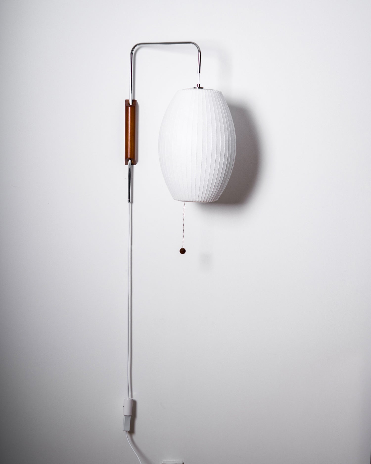 Orbit Plug-In Swing Sconce