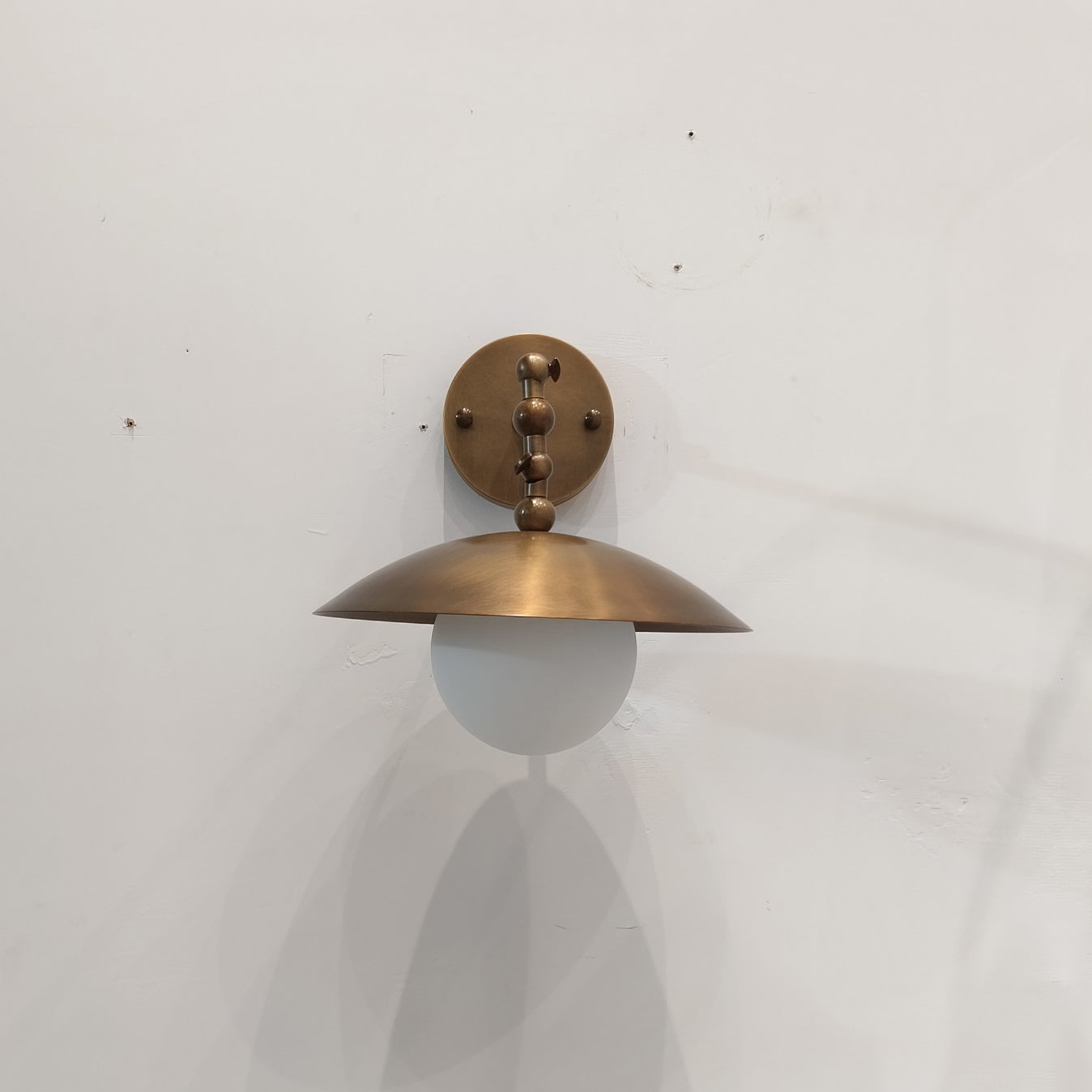 Alabaster Orb & Brass Dome Wall Sconce
