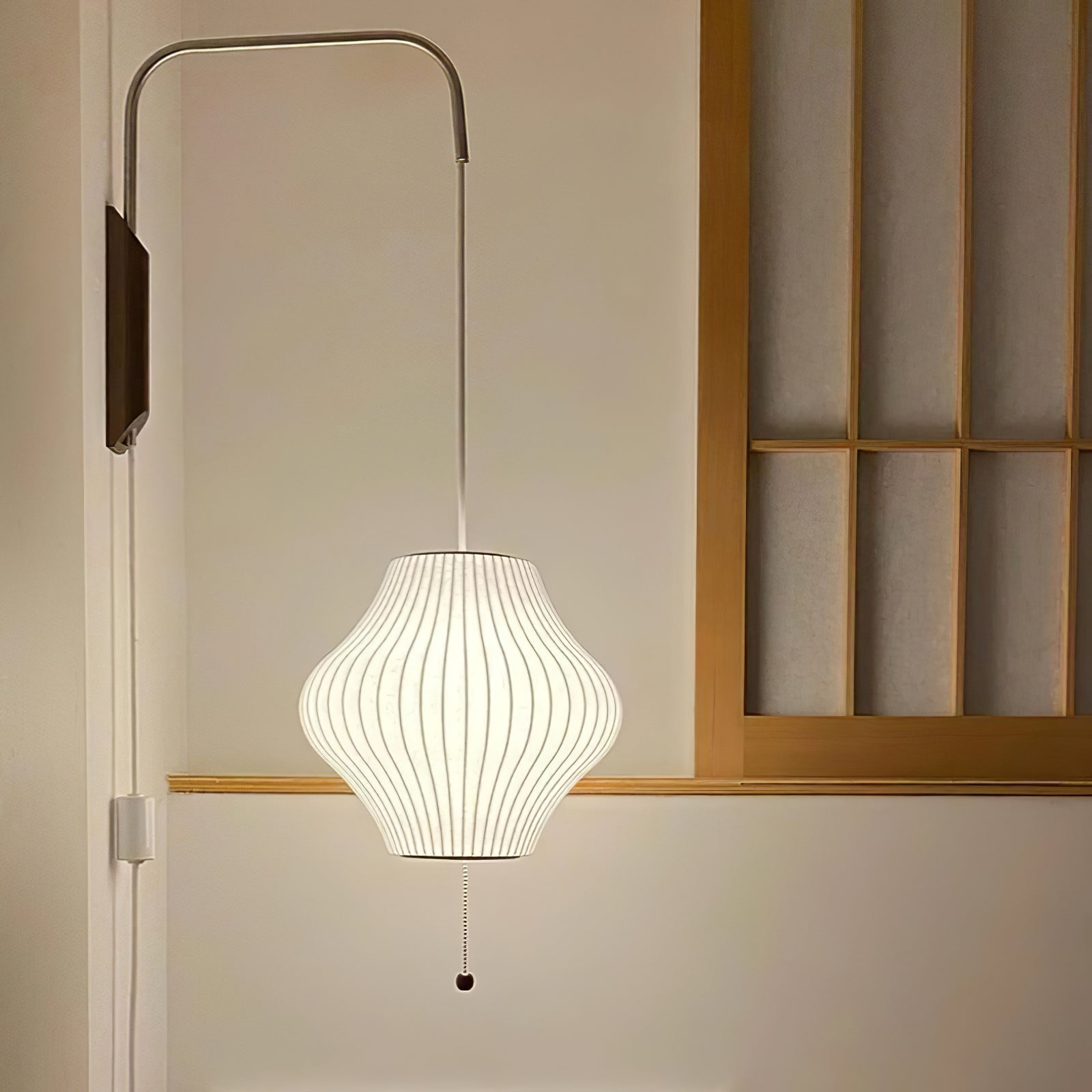 Orbit Plug-In Swing Sconce