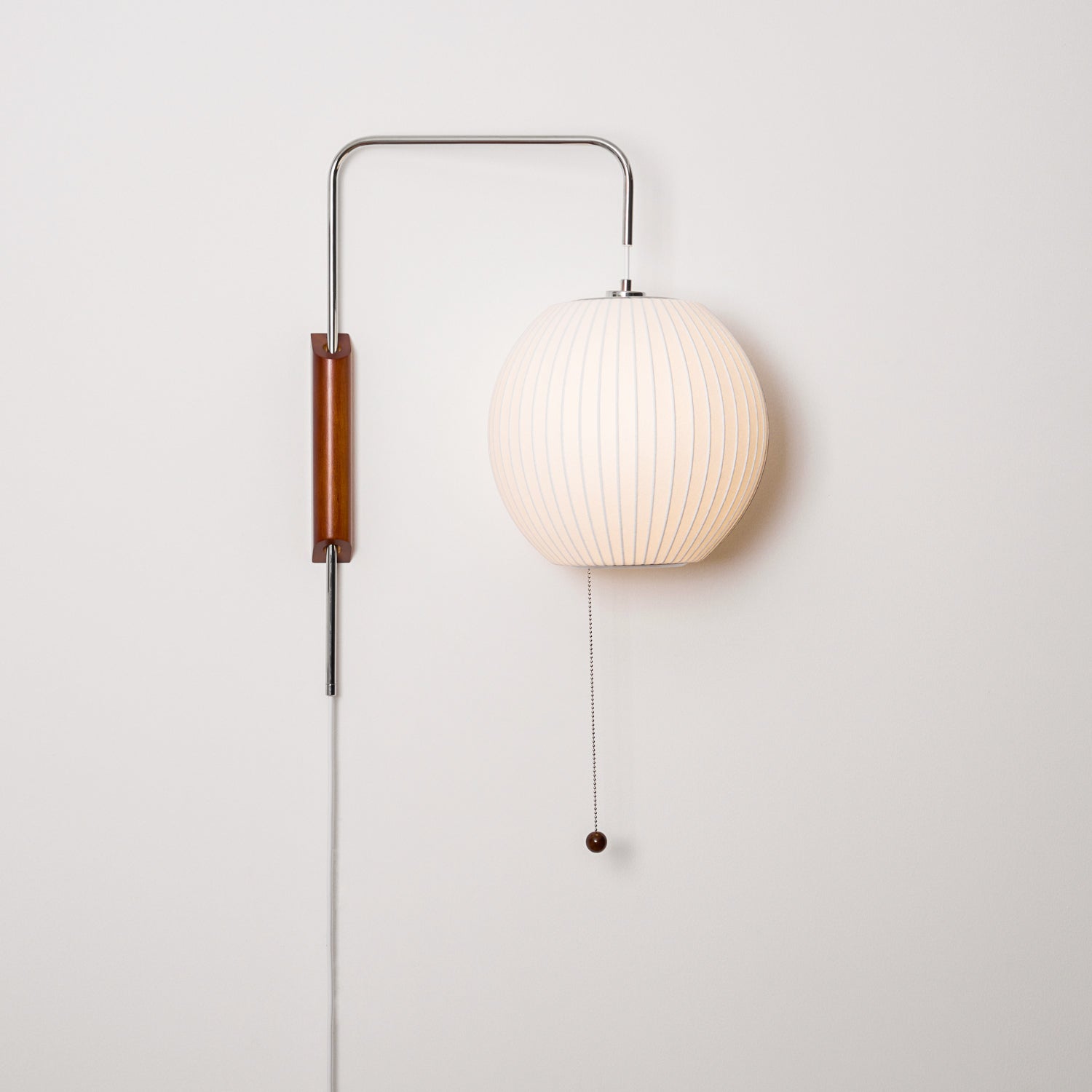 Orbit Plug-In Swing Sconce