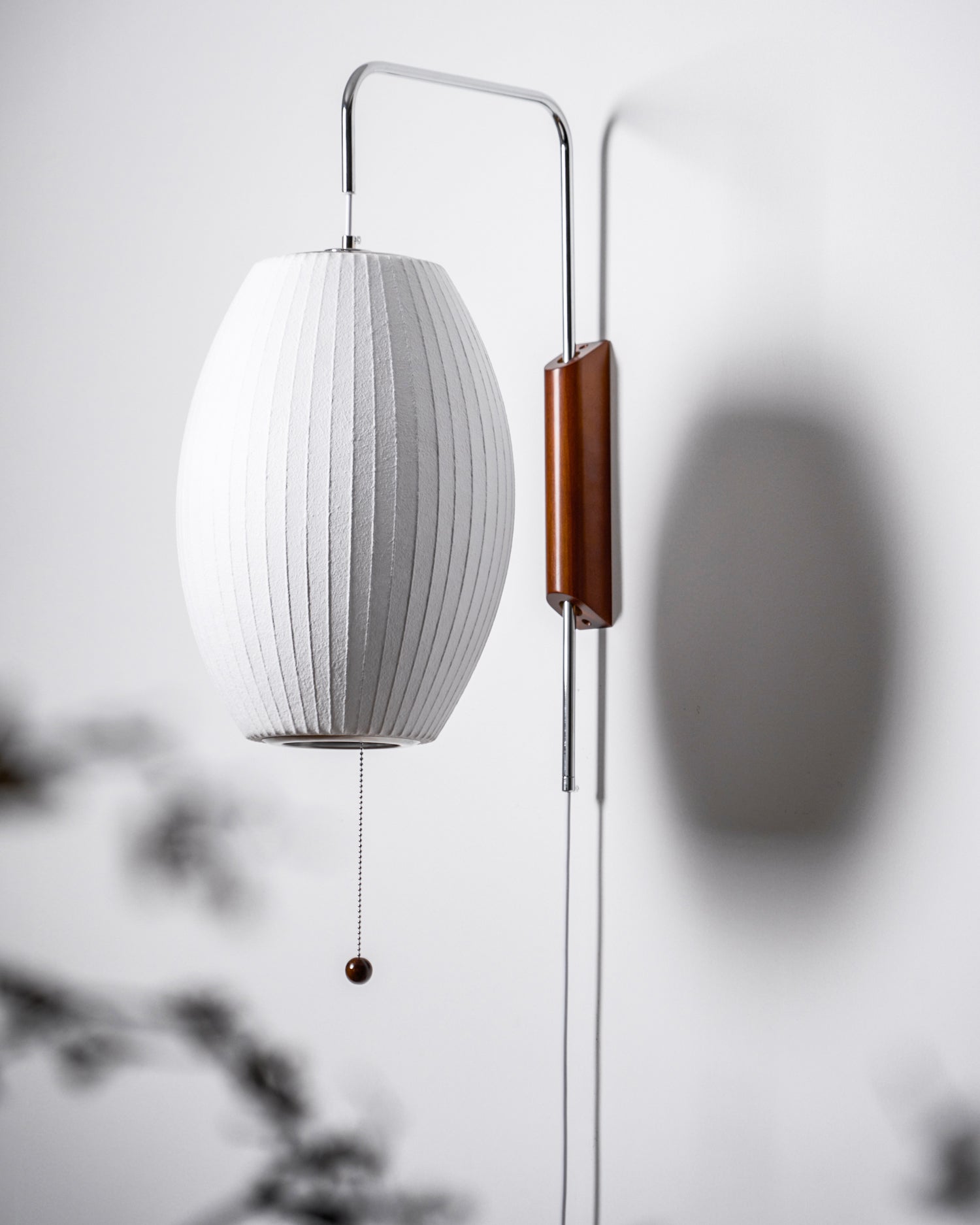 Orbit Plug-In Swing Sconce