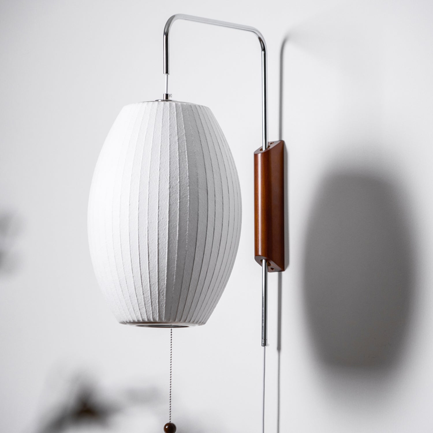 Orbit Plug-In Swing Sconce