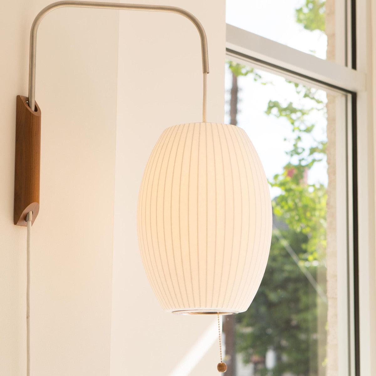 Orbit Plug-In Swing Sconce