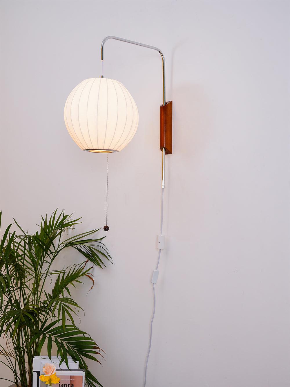 Orbit Plug-In Swing Sconce