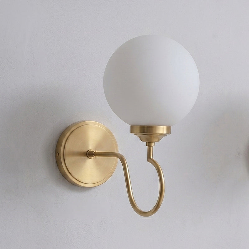 Curved Arm Brass Glass Globe Sconce