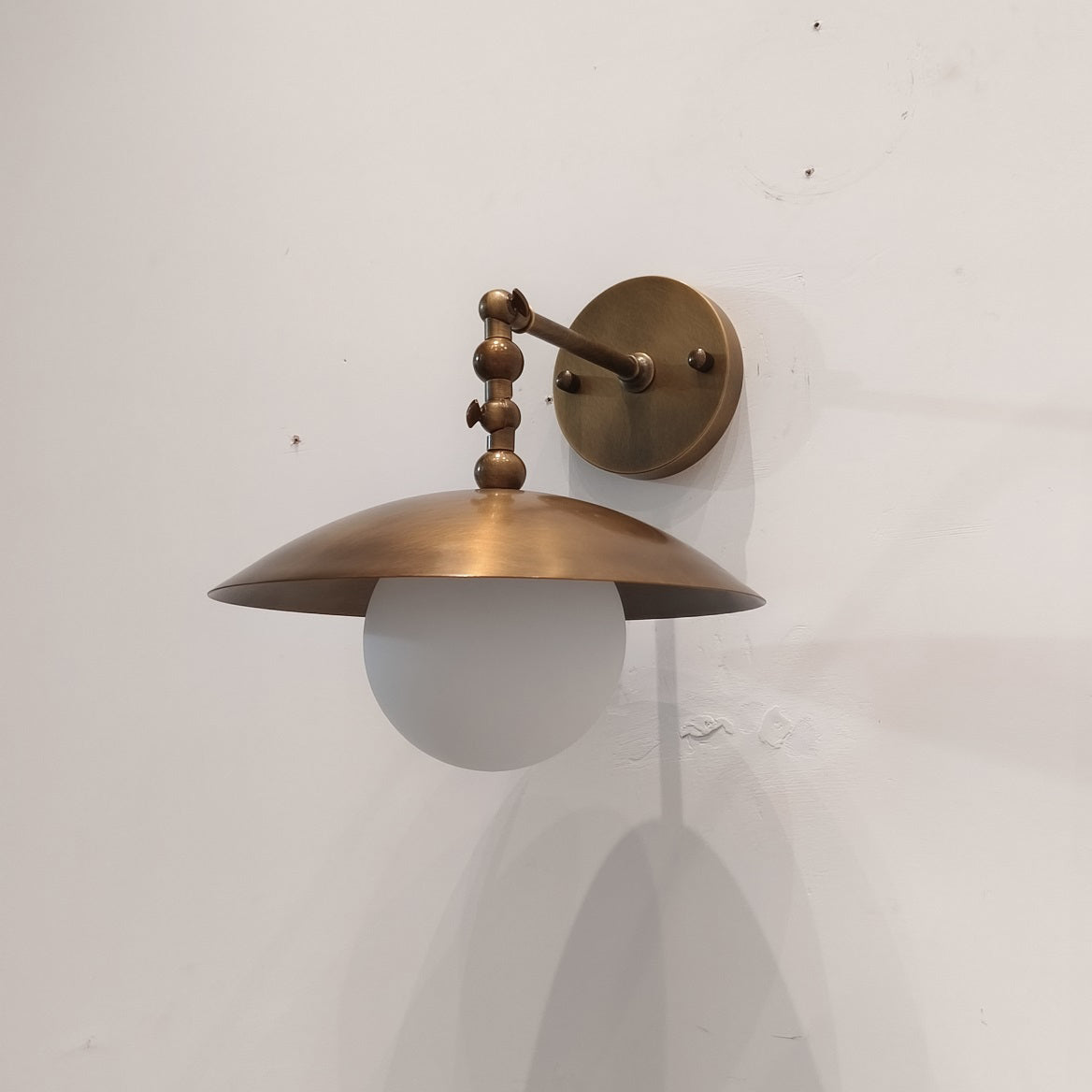 Alabaster Orb & Brass Dome Wall Sconce