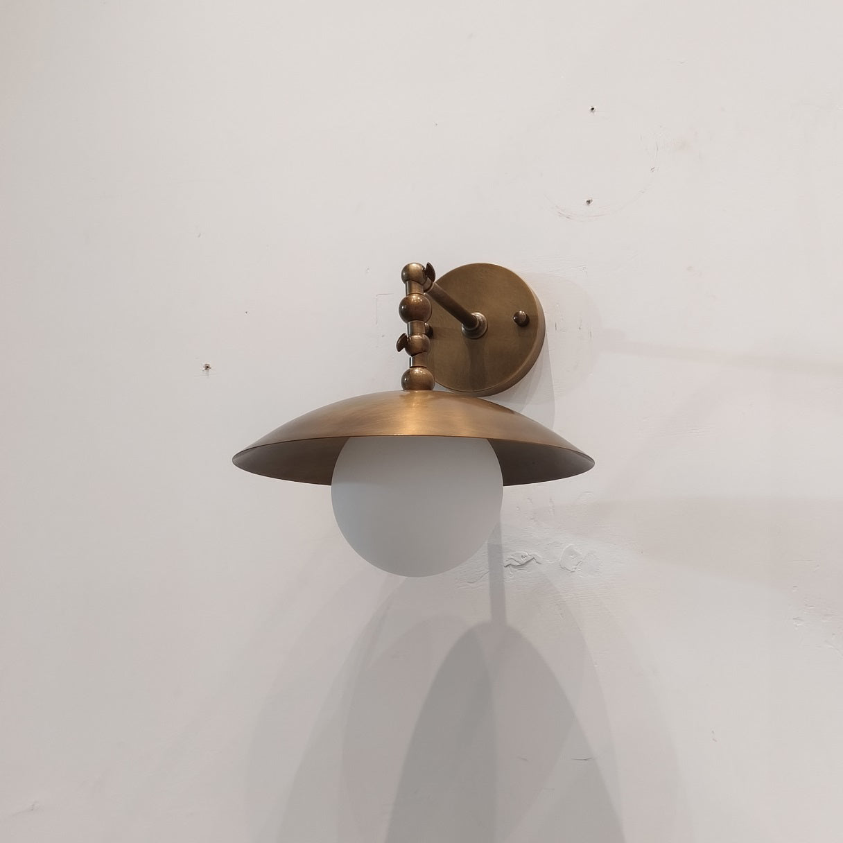 Alabaster Orb & Brass Dome Wall Sconce