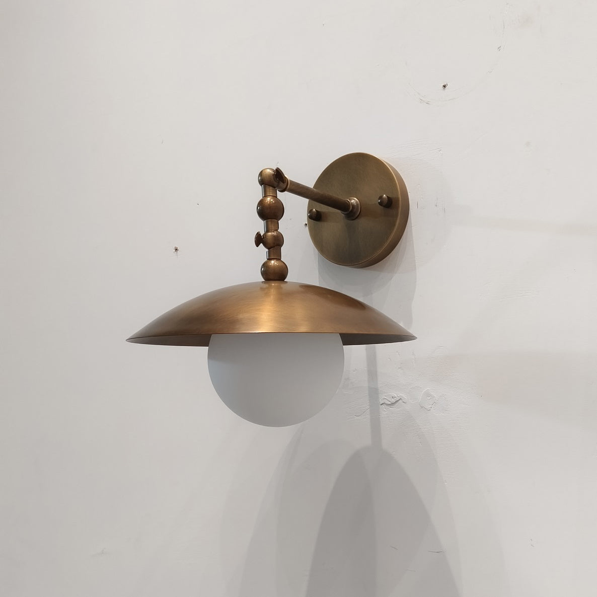 Alabaster Orb & Brass Dome Wall Sconce