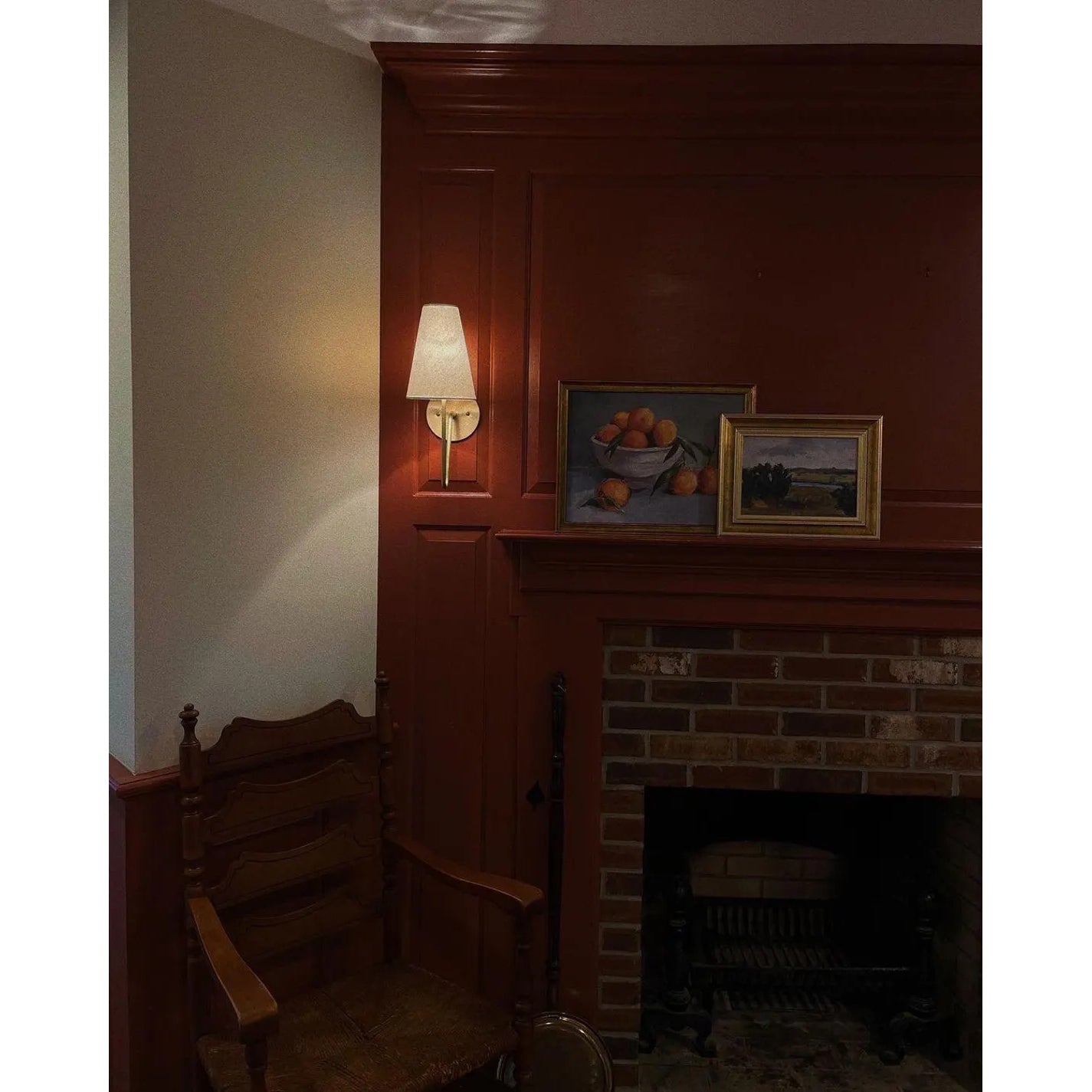 Cove Antiqued Brass Curved Sconce