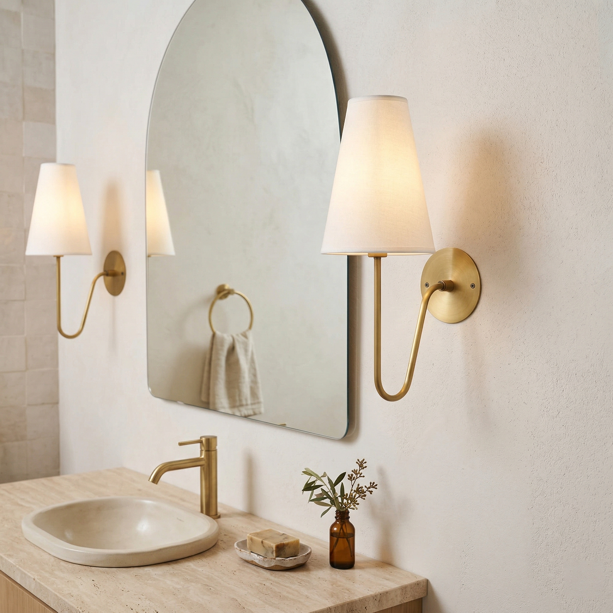 Cove Antiqued Brass Curved Sconce
